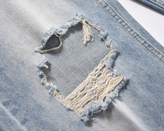 Light Blue Worn In Wash Ripped Knee Loose Fit Denim