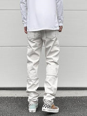 Ivory Trashed Distressed Slim Leg Denim