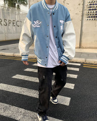 Light Blue Mended Heart Patched Leather Varsity Jacket